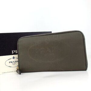 Authentic PRADA 1M0506 logo zip around purse Nylon [Used]